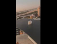 Collab ClipsIG - Chicken nugget box blown off of table on roof of apartment