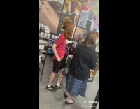 Boy with half long and short hair 