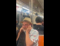 Two men shout and perform inside train