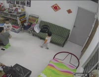 Little girl walks into wall 