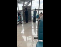 Two photoshoot beside each other at airport