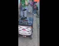 Coco food delivery robot on sidewalk