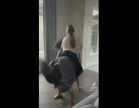 Three girls posing acting like they are a horses and rider 