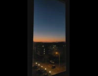 Hyperlapse of sunset to night window sky