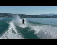Black wetsuit guy falls off wakeboard fail 