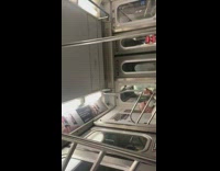 Guy on subway wears white face mask 