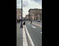 Man tank top dances side of road