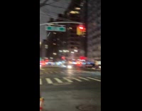 Smokes from steam vent cone in road