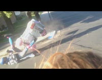 Guy Dragged In Barbie Toy Car in Parking Lot Flips Over