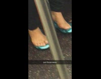 woman bare feet on blue shoes