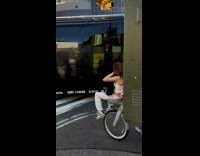Collab WINY - Woman sits on citibikes basket