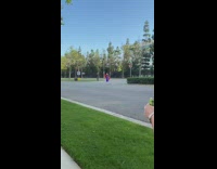 Woman red violet dress photo shoot empty street Shen Yun