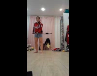 Little girl catches puck with hockey stick