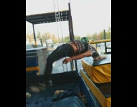 Collab risksIG - Guy front flips off yellow blue safety mat into foam pit on wooden stage