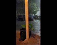 Filmer show storm outside then lightning strikes