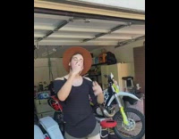 Couple swap clothes famous dirt bike garage 