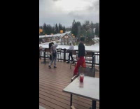 Man red pants pose on railings ski resort
