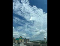 Collab WINY - Six escort helicopters pass over highway bridge