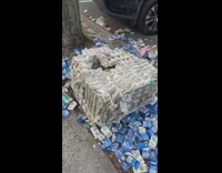 empty blue cigarette boxes on sidewalk 