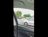 Two girls run play on parking lot