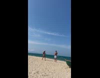 Collab IITW - Woman pink bikini beach hat walks with coconut