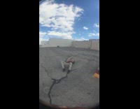 Skateboarder grinds a curb and scrapes elbow on concrete