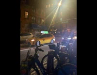 Black car honks loudly at stopped taxi 