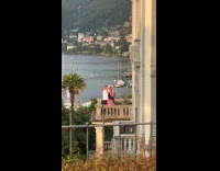 Collab BoysIG_Default - Couple wave at family on house across