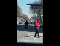Guy rides around motorcycle with popped tire