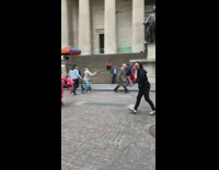 Pink and red lumpy costume guy dances 