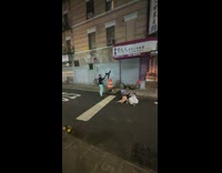 2 women lies down on the street 