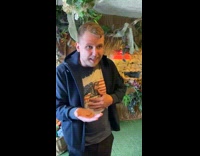 Man eats worm from bowl taste test