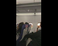 Sun and Moon seen on the airplane window