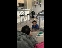 Twin Curly Babies Excitedly Crawls towards Lady