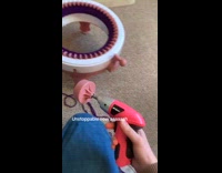 Woman uses drill for knitting machine