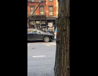 Long line sidewalk outside the pizza store 