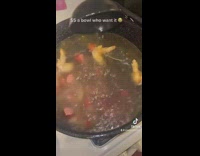 Lady Stirs Chicken Wings and Hotdog Stock