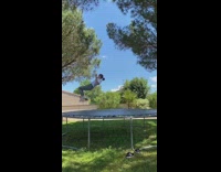 Girl doing backflips goes through trampoline 