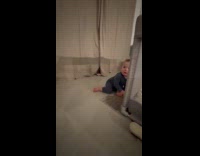 Woman dressing up as Ms. Rachel for baby