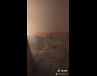 Girl blue towel video games red shirt