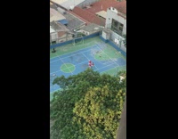 Three women red top dance basketball court