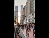 Collab WINY - Large group cyclist ride on street