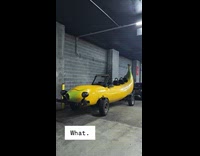 Customized banana shaped car with multiple seats