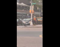 Shirtless man beg with long stick and cup