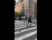 Collab WINY - Girl hold sign that says Why nyc marathon
