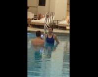 Woman duck lips in swimming pool