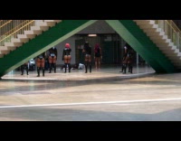Women leather outfit group dance near stairs