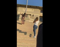 Black dress girl poses stairs car alarm 
