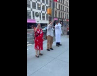 People ICE protest blows horn on street