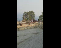 Three people black top tiktok dance sunset